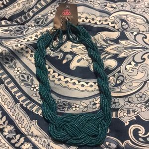 Necklace/earring set.